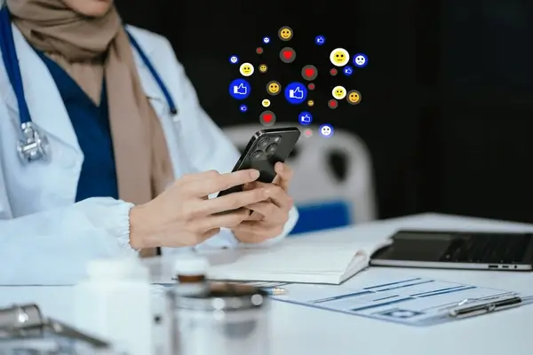 Healthcare professional using social media ads to connect with patients and grow their agency.